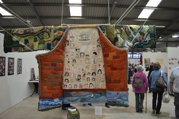 Members of the town came together to knit the five metre wide cardigan